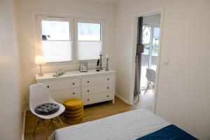 Łóżko lub łóżka w pokoju w obiekcie Apartament Domek Romi w Augustowie do wynajęcia