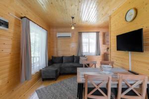 TV a/nebo společenská místnost v ubytování LAGUN POOL VILLAGE