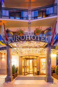 a hotel entrance with a sign that reads burriott at Eurohotel in Lviv