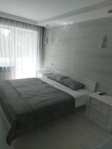 Ліжко або ліжка в номері Sanatoriy-Hotel Feofaniya
