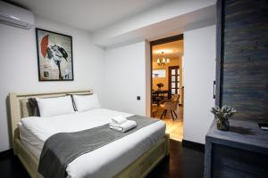 Voodi või voodid majutusasutuse The Phoenix Boutique Hotel toas