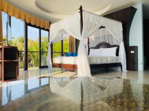 Postel nebo postele na pokoji v ubytování Koh Tao Regal Resort - SHA Plus