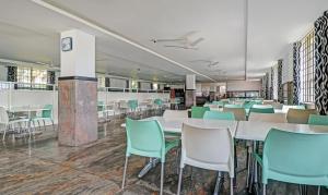 Restaurace v ubytování Treebo Green Land Kushalnagar, 300 M From Nisargadhama Forest