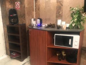 Kuchyň nebo kuchyňský kout v ubytování DESYATINNAYA Hostel