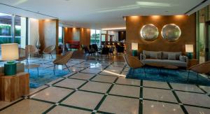Uma área de estar em TURIM Presidente Hotel