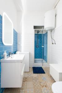 a bathroom with a sink and a shower at BUDAPEST4U - New apt in the central of Budapest in Budapest