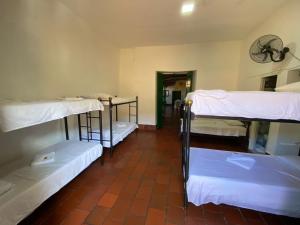 La Mansion Hostel tesisinde bir ranza yatağı veya ranza yatakları