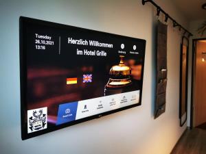 TV a/nebo společenská místnost v ubytování Hotel Grille