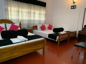 Letto o letti in una camera di Sobha Holiday Home
