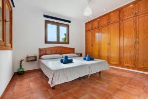 Posteľ alebo postele v izbe v ubytovaní Las Casitas 28