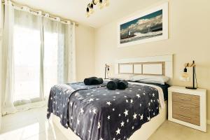 A bed or beds in a room at Apartment Todo Bien