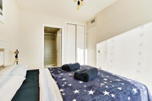 A bed or beds in a room at Apartment Todo Bien