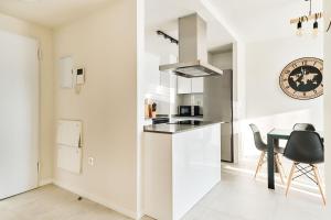 A kitchen or kitchenette at Apartment Todo Bien