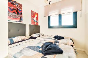 A bed or beds in a room at Apartment Todo Bien