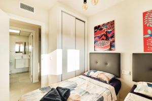 A bed or beds in a room at Apartment Todo Bien