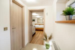 Letto o letti in una camera di Apartmán u Jiříka