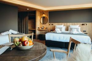 Voodi või voodid majutusasutuse Lodji Hotel & spa toas
