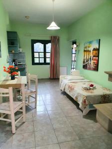 Posteľ alebo postele v izbe v ubytovaní Dioskouroi Apts