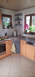 Kuchyň nebo kuchyňský kout v ubytování Bine's Home