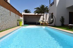 Bazén v ubytování Tilley. Private Villa nebo v jeho okolí