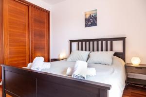 Postel nebo postele na pokoji v ubytování Tilley. Private Villa