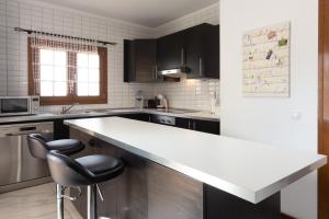 Kuchyň nebo kuchyňský kout v ubytování Tilley. Private Villa