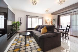 Posezení v ubytování Tilley. Private Villa