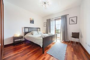 Postel nebo postele na pokoji v ubytování Tilley. Private Villa