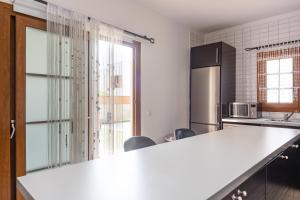 Kuchyň nebo kuchyňský kout v ubytování Tilley. Private Villa