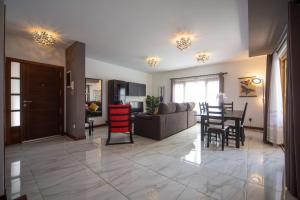 Posezení v ubytování Tilley. Private Villa