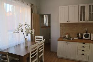 Kuchyň nebo kuchyňský kout v ubytování Charles Square Apartments