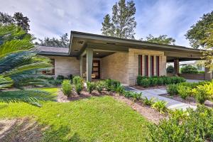 a brick house with a landscaping at Mid-Century Dream Home Less Than Half-Mile to Beach! in Ocean Springs