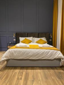 A bed or beds in a room at Allegra Suites