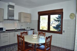 Kuchyňa alebo kuchynka v ubytovaní Apartamentos Picea Azul + 17 fotografií