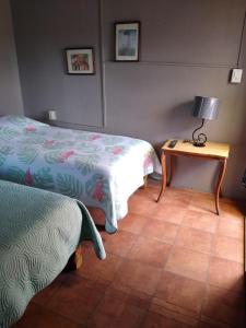 Rúm í herbergi á Hostal don Felipe