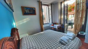 Postel nebo postele na pokoji v ubytování B&B La Veranda - Iseo