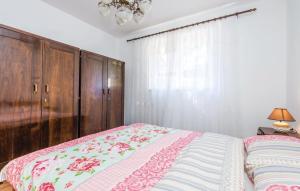 Postel nebo postele na pokoji v ubytování Apartman Marsanic