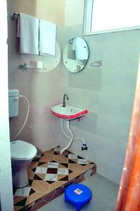 Kylpyhuone majoituspaikassa SRG INN HOTEL