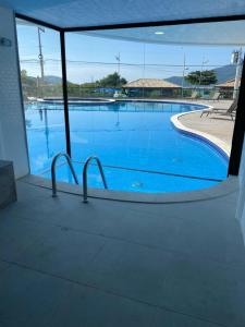The swimming pool at or close to Residencial clube praia dos anjos
