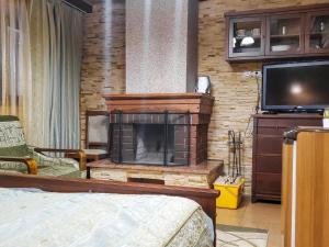 TV a/nebo společenská místnost v ubytování Elf-cottage