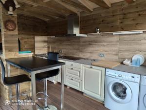 Kuchyň nebo kuchyňský kout v ubytování B&B Hotel Elselina