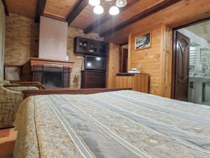 Postel nebo postele na pokoji v ubytování Elf-cottage