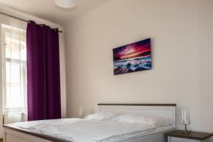 Postel nebo postele na pokoji v ubytování Welcome Hostel & Apartments Praguecentre