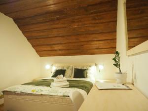 Ein Bett oder Betten in einem Zimmer der Unterkunft Ubytovanie&Reštaurácia Bodliak