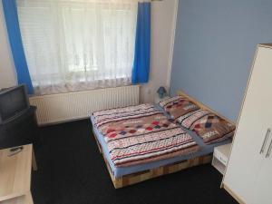 Postel nebo postele na pokoji v ubytování Apartmá Gister ski and wellnes