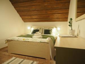 Ein Bett oder Betten in einem Zimmer der Unterkunft Ubytovanie&Reštaurácia Bodliak
