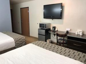 Postel nebo postele na pokoji v ubytování Microtel Inn & Suites by Wyndham Klamath Falls