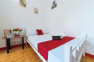 Ένα ή περισσότερα κρεβάτια σε δωμάτιο στο RedDoorz at Pag Asa Rawis Legazpi +23 φωτογραφίες