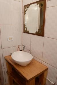 ห้องน้ำของ Quintal das Araucárias hospedagem