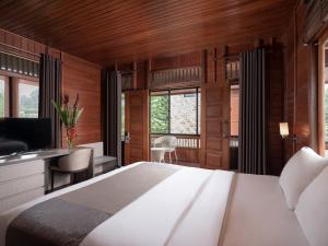 JSI Resort房間的床